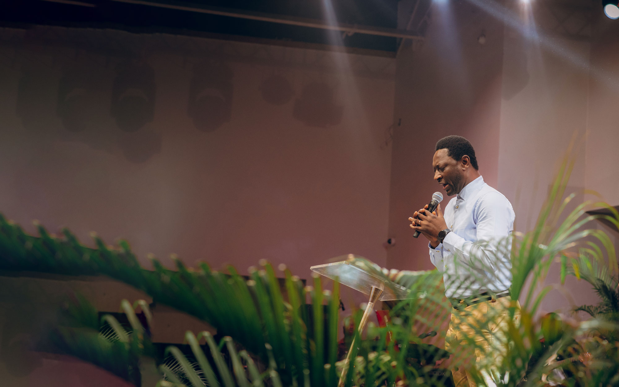 Moses Michaels speaking to an audience