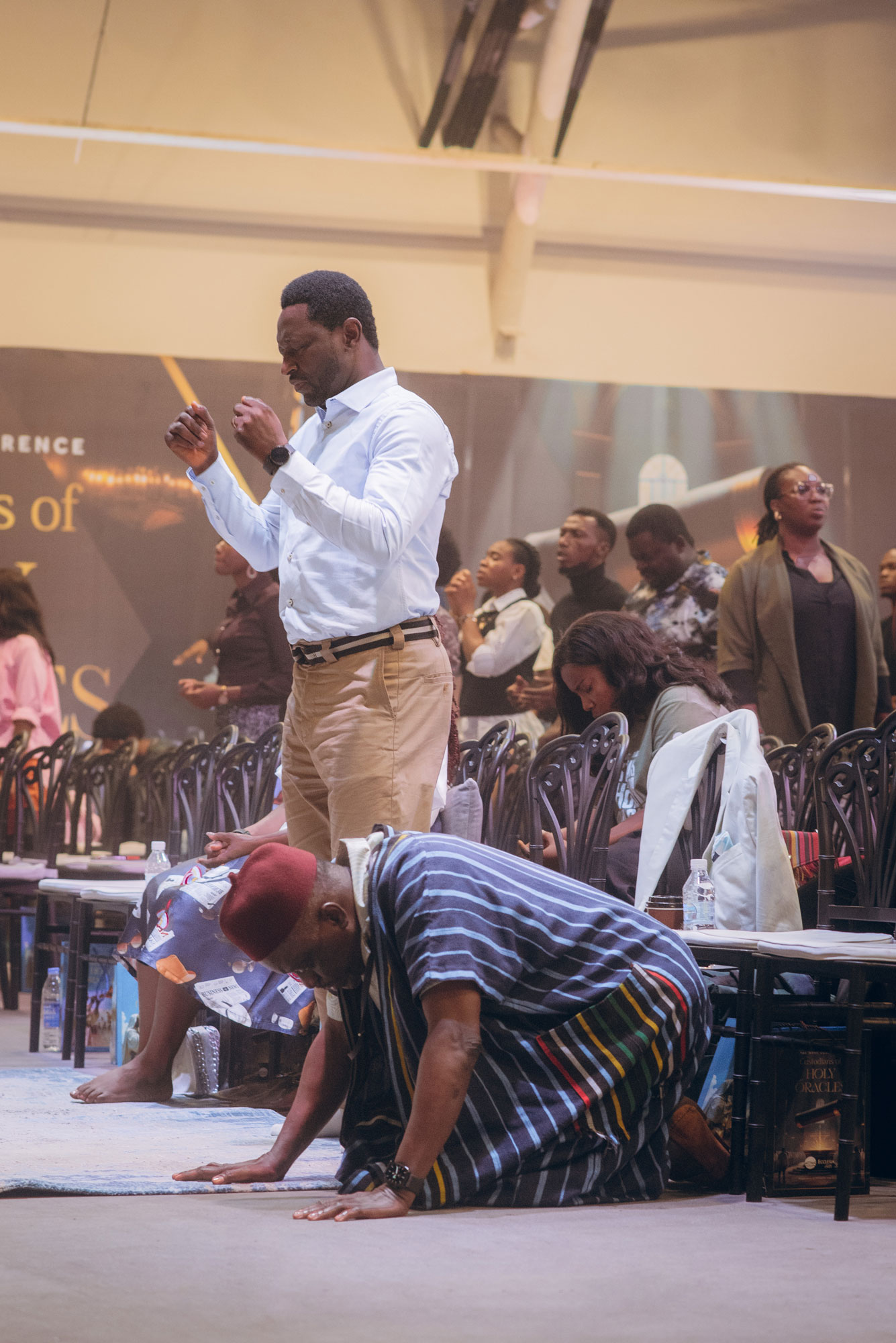 Moses Michaels speaking to an audience